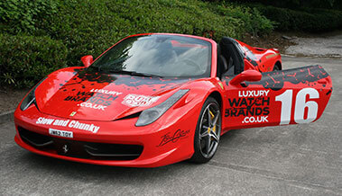 Ferrari in red with vehicle graphics